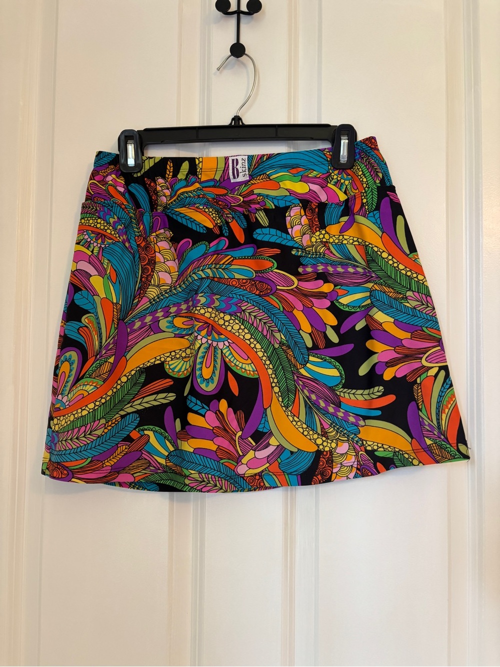 B-Skinz - Women’s Black Skort with Bright Multicolor Swirl Print. Size M (8-10)